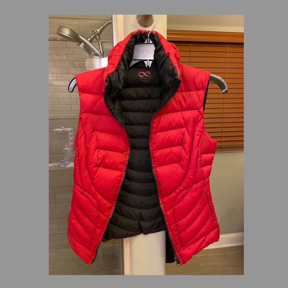 red puffy vest